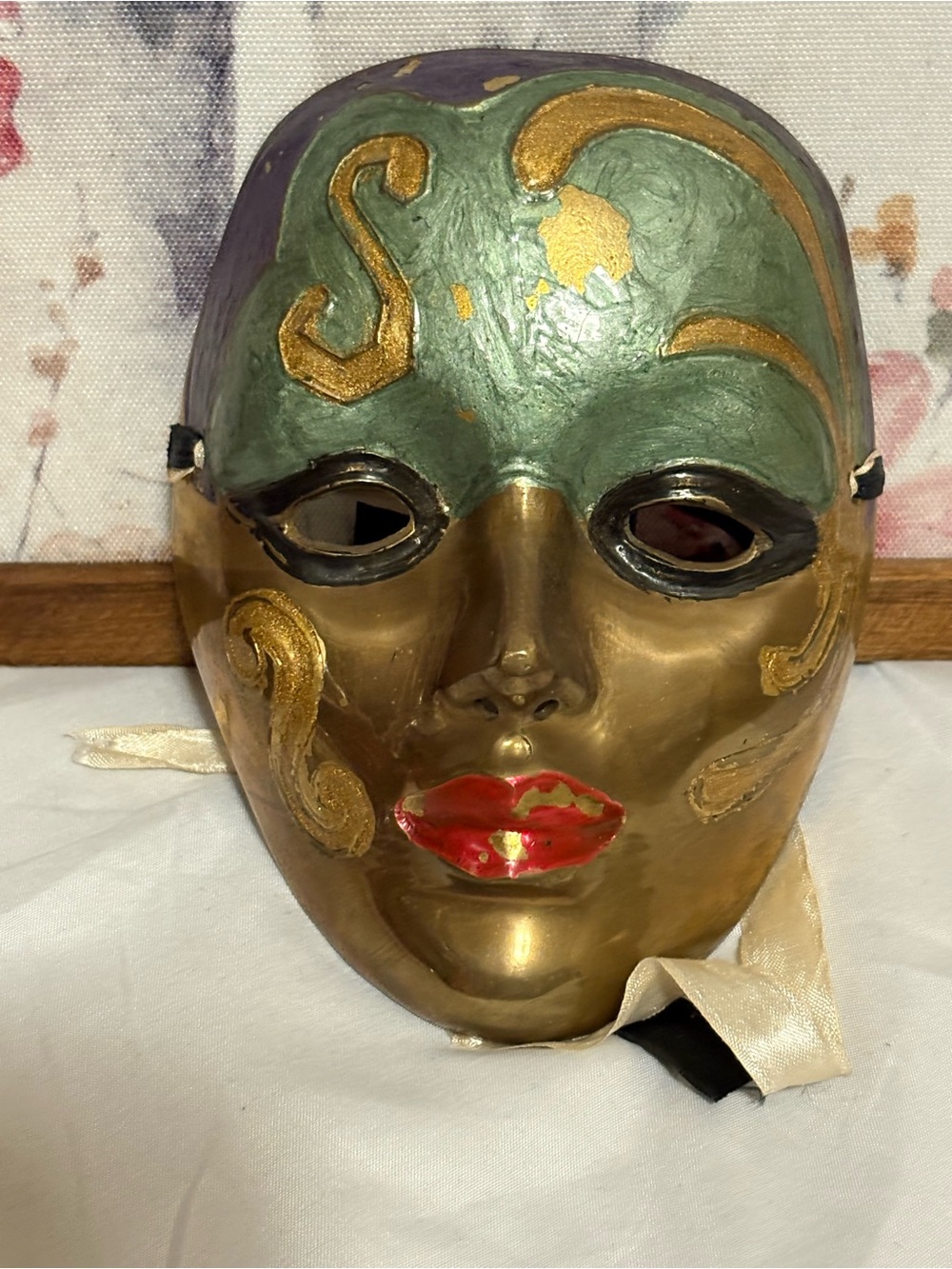 Gold and Green Venetian-Style Decorative Mask with Red Accents